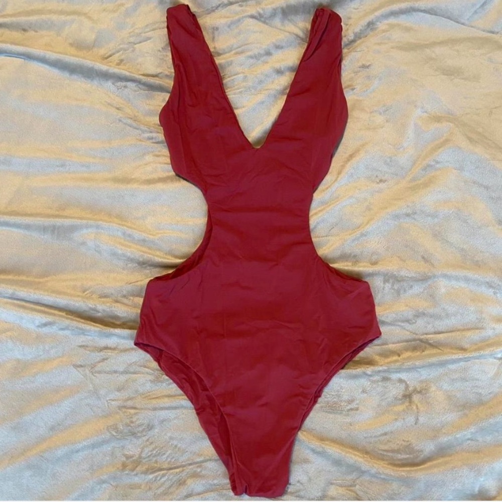 Vibrant Red One Piece Swimsuit with Plunging Neckline and Side Cut-Outs